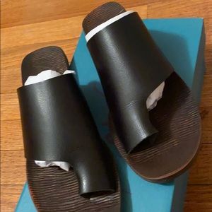 Black blowfish slip ons